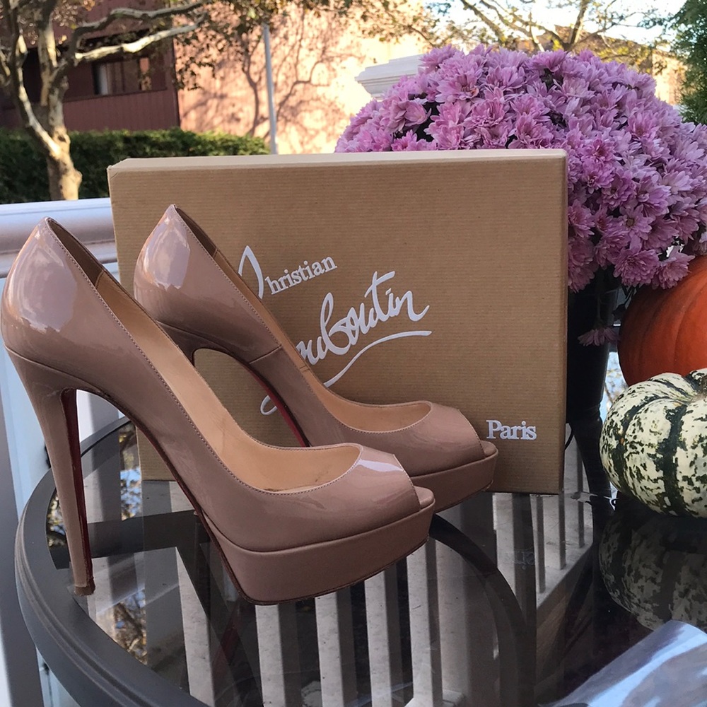 Like New Christian Labougten Nude shoes.